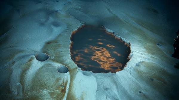 Editorial illustration for How Deep-Sea Brine Pools Form Underwater Lakes—and Why Life Crowds Their Deadly Shores