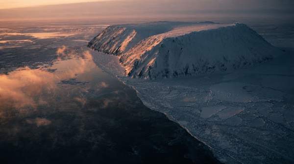 Editorial illustration for How Thawing Permafrost Creates a Climate Feedback Loop